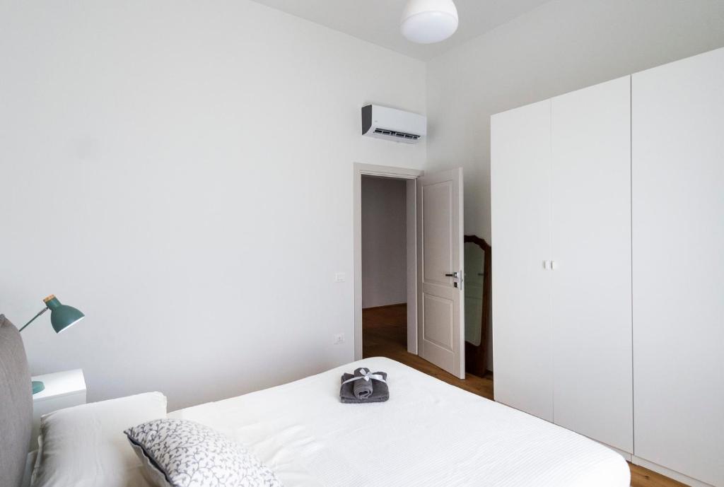 Łóżko lub łóżka w pokoju w obiekcie Gualchierina apartment