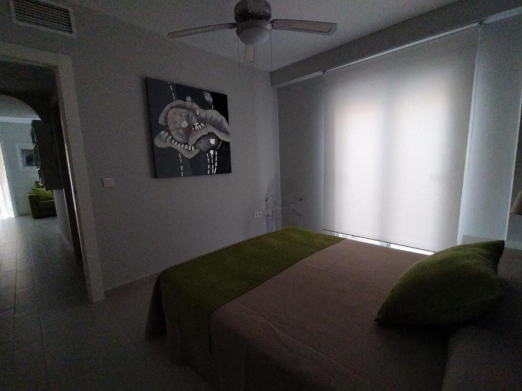 Łóżko lub łóżka w pokoju w obiekcie Vera Albacora