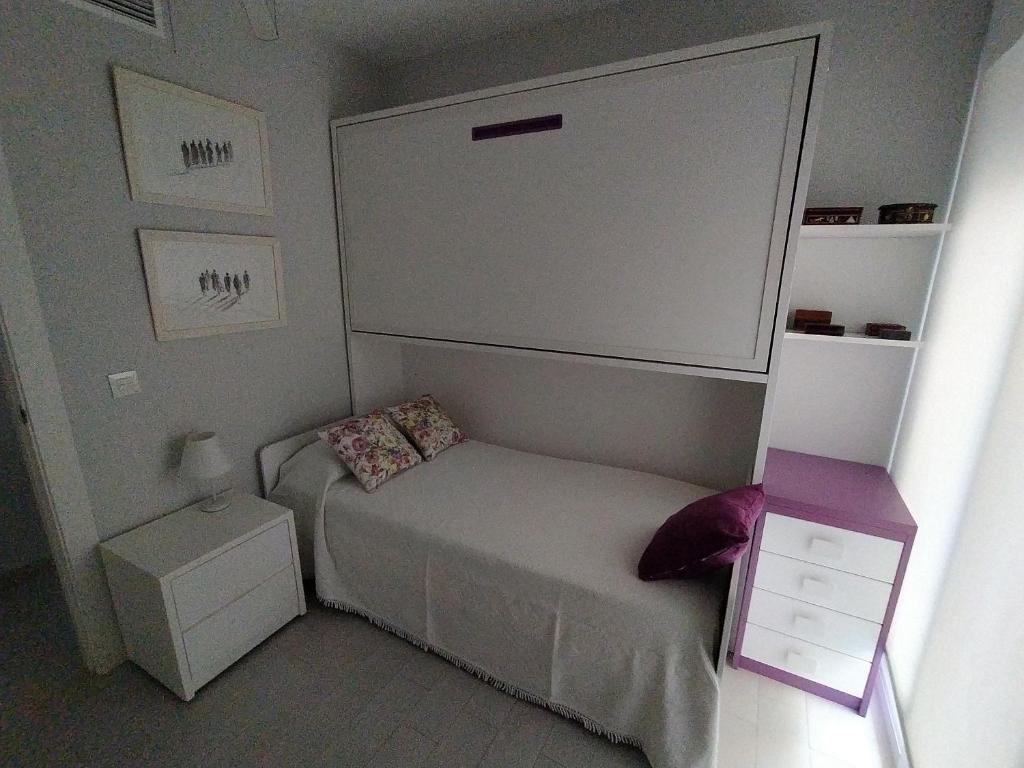 Łóżko lub łóżka w pokoju w obiekcie Vera Albacora