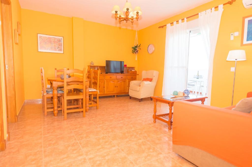 Televízia a/alebo spoločenská miestnosť v ubytovaní Terraza vista piscina
