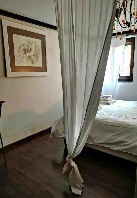 Postel nebo postele na pokoji v ubytování Levantes Mansion