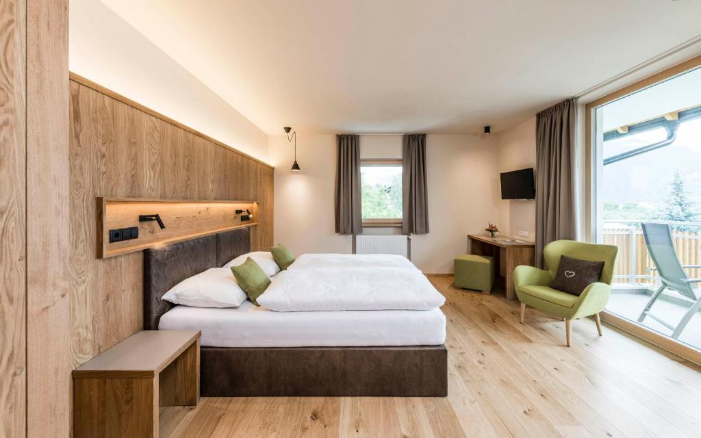 Postel nebo postele na pokoji v ubytování Hotel Birkenbrunn