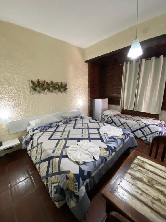 Cama ou camas em um quarto em Palace Hotel