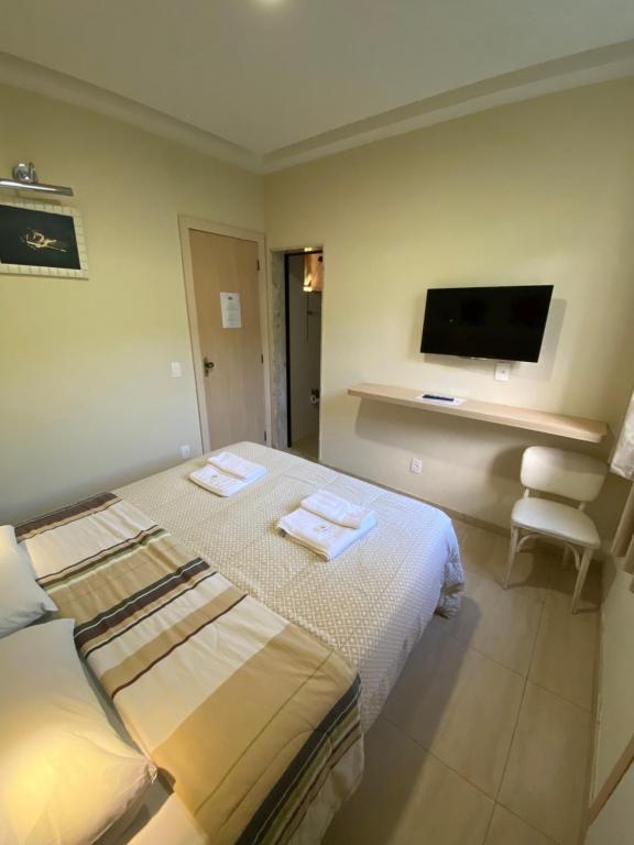 Cama ou camas em um quarto em Palace Hotel