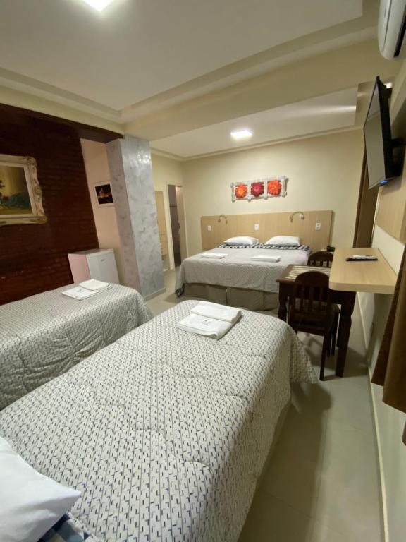 Cama ou camas em um quarto em Palace Hotel