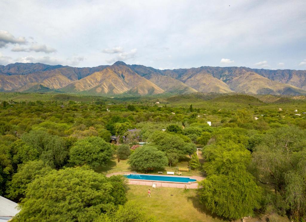 an aerial view of a resort with mountains in the background at Magenta Complejo Cabañas & Spa in San Javier