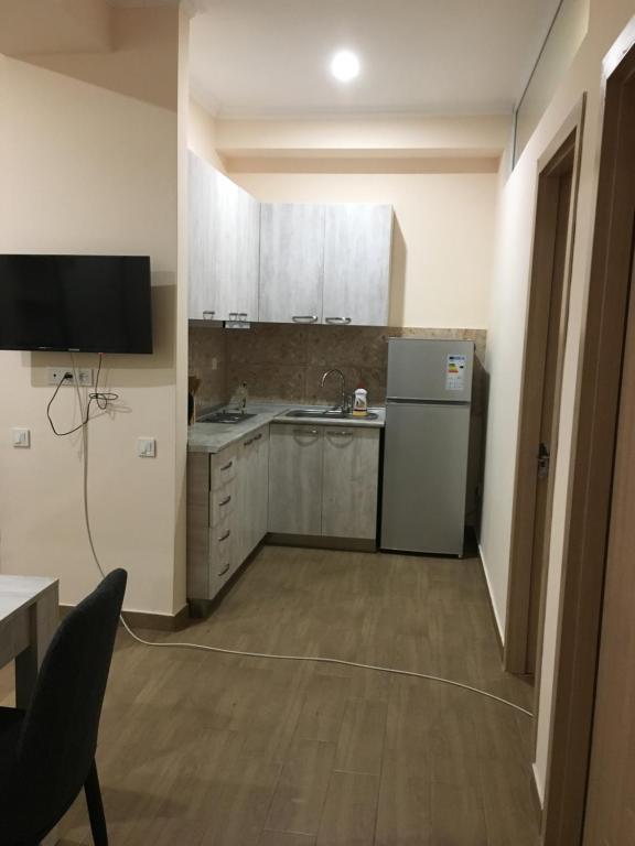 Kuchyň nebo kuchyňský kout v ubytování Kvariati apartamenrs