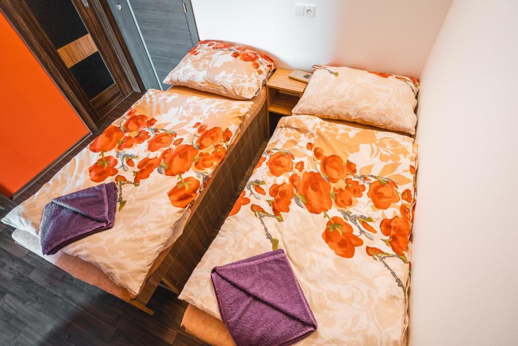 Postel nebo postele na pokoji v ubytování Luční penzion