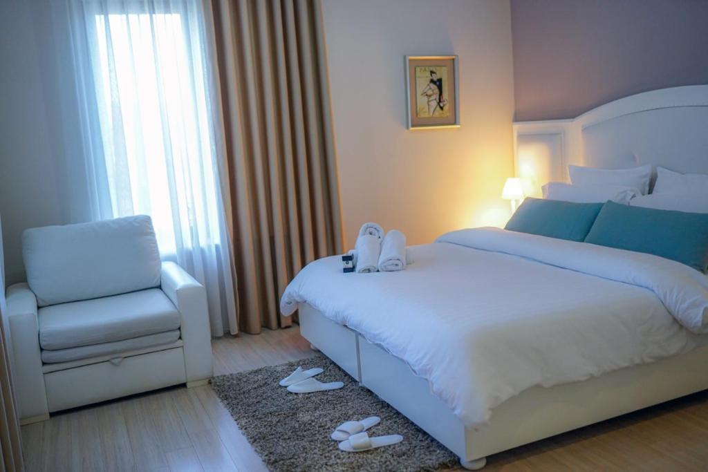 Postel nebo postele na pokoji v ubytování Univers Resort