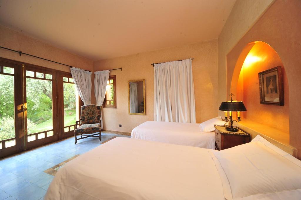 Postel nebo postele na pokoji v ubytování MAROC LODGE Atlas Mountain Retreat