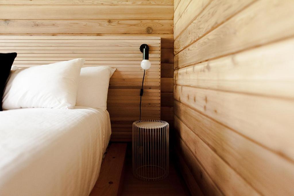 Ένα ή περισσότερα κρεβάτια σε δωμάτιο στο Bodega Ridge & Cove Cabins