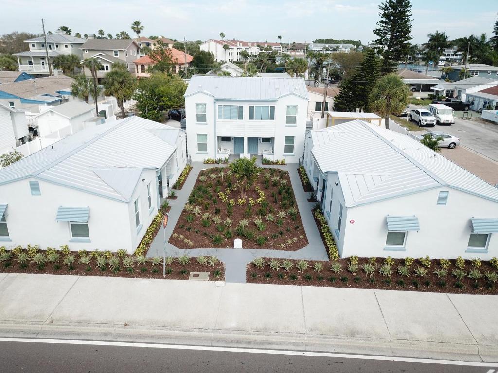 a large white building with a white roof at Silver Sands in St Pete Beach