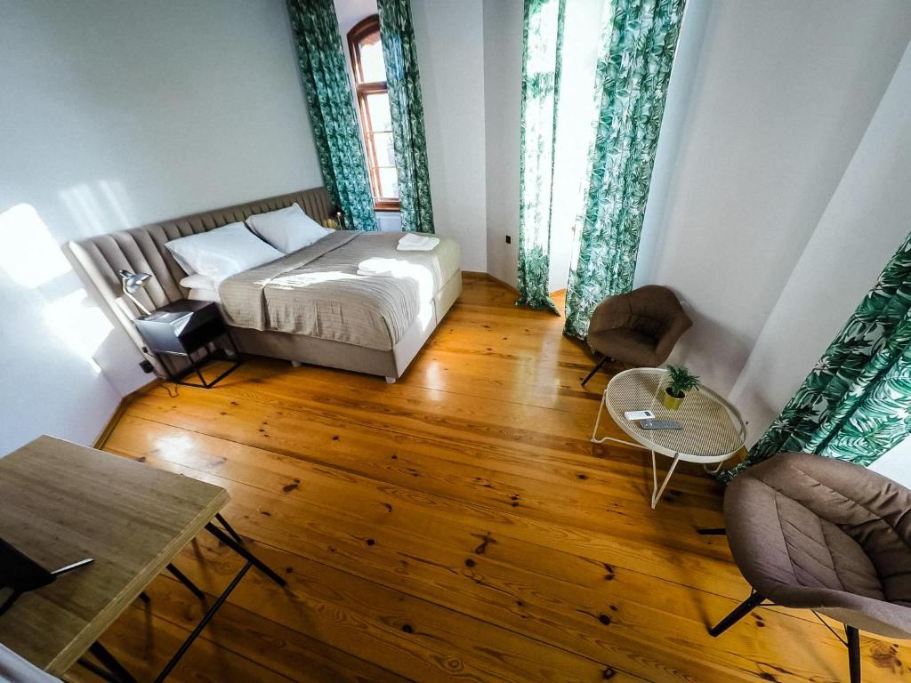 Posteľ alebo postele v izbe v ubytovaní Apartamenty w Wieży