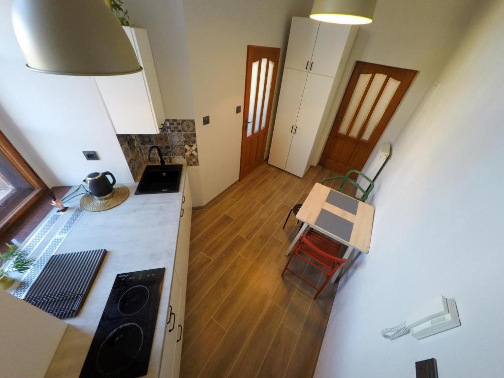 Kuchyňa alebo kuchynka v ubytovaní Apartamenty w Wieży