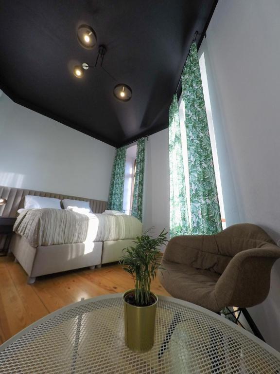 Posedenie v ubytovaní Apartamenty w Wieży