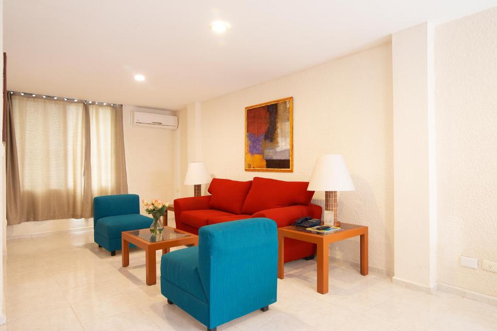 Posezení v ubytování Hotel y Suites Nader