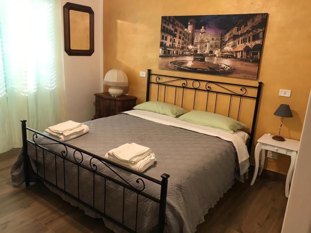 Postel nebo postele na pokoji v ubytování Le Giare House