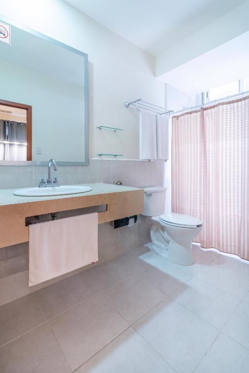 Koupelna v ubytování Hotel y Suites Nader