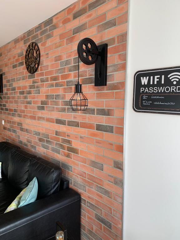 Posezení v ubytování Gite 5 pers avec 2h espace bien-être privatisé inclus dans le prix de la nuit 80m2 de détente