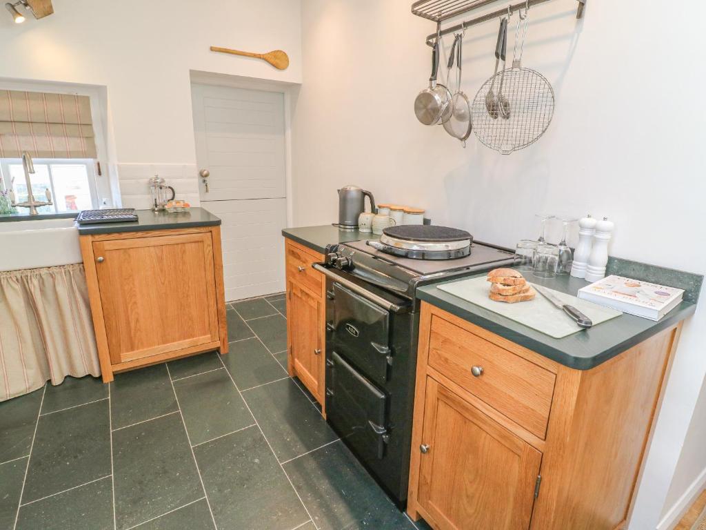 Kuchyň nebo kuchyňský kout v ubytování Howgill Cottage