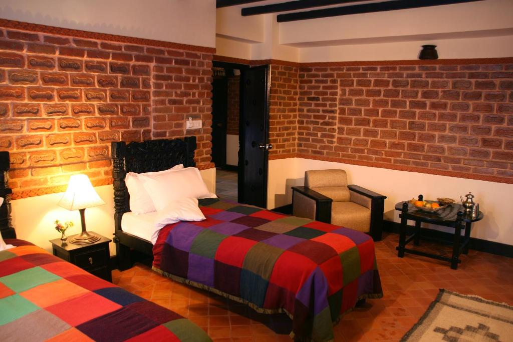 Postel nebo postele na pokoji v ubytování Hotel Heritage