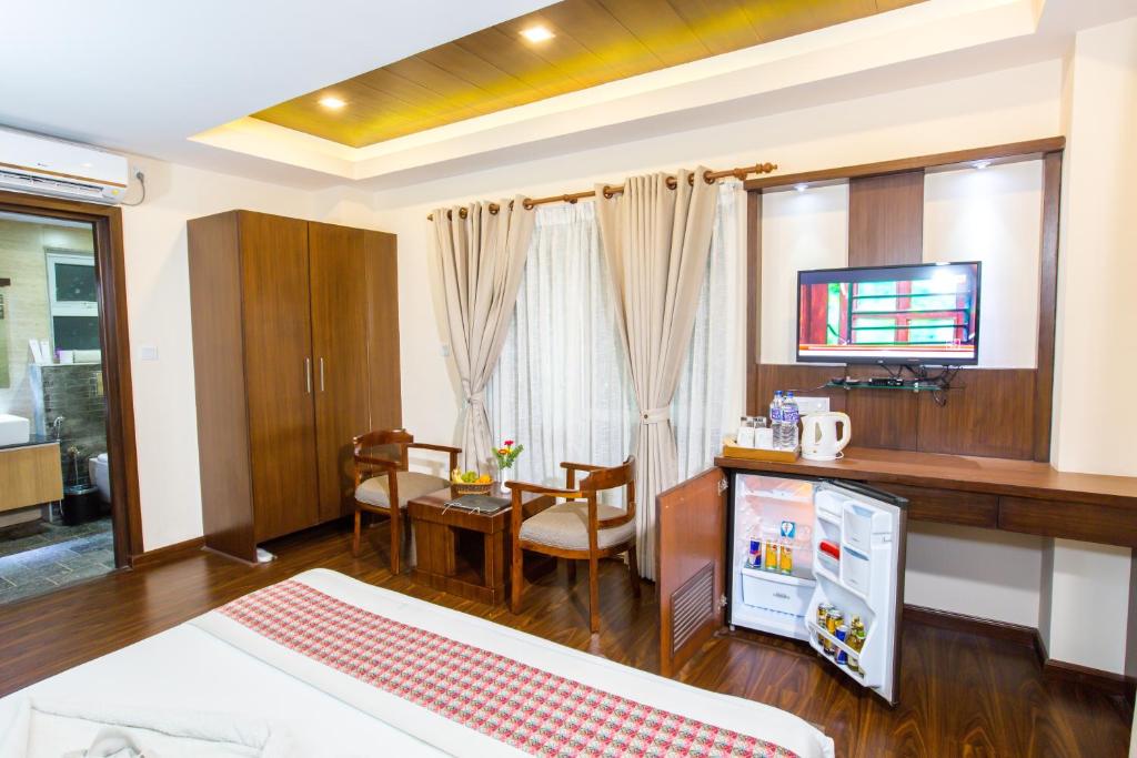 TV a/nebo společenská místnost v ubytování Kathmandu Suite Home