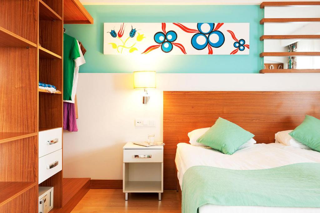 Postel nebo postele na pokoji v ubytování Calimera Side Resort
