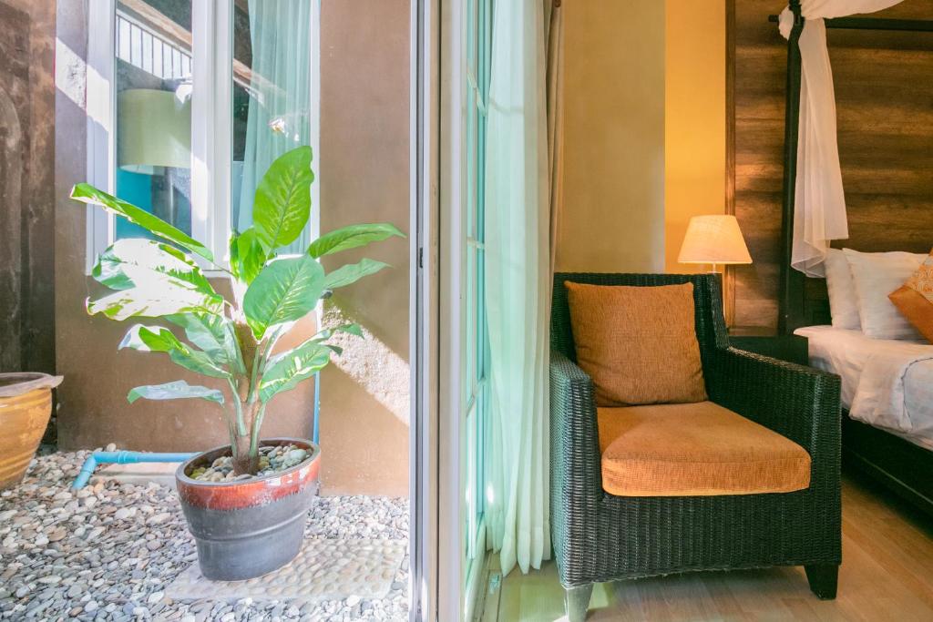 Postel nebo postele na pokoji v ubytování Baan PhuAnda Phuket