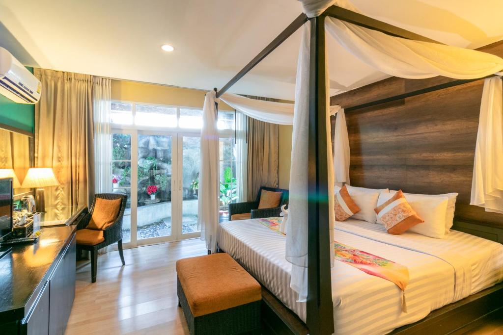 Postel nebo postele na pokoji v ubytování Baan PhuAnda Phuket