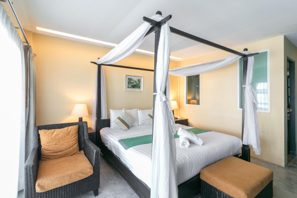 Postel nebo postele na pokoji v ubytování Baan PhuAnda Phuket