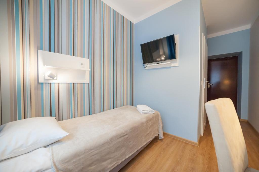 TV a/nebo společenská místnost v ubytování Premium Hostel