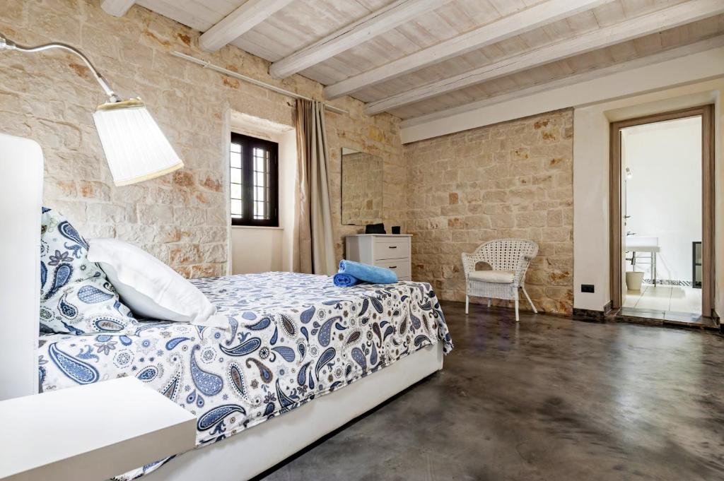 Łóżko lub łóżka w pokoju w obiekcie Villa Antica Aia Relax