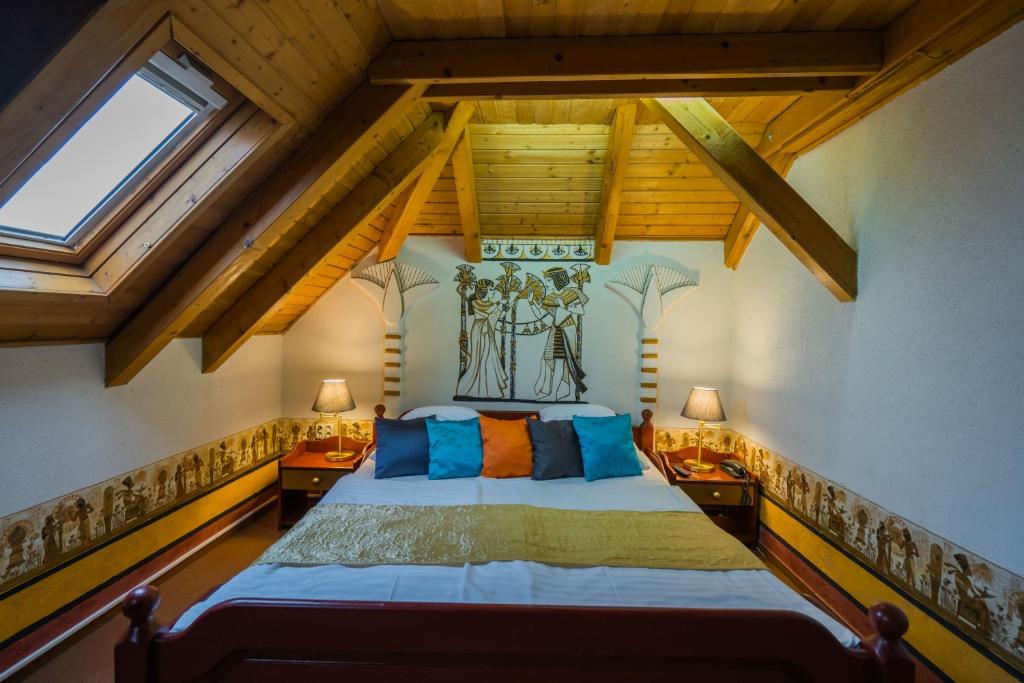 Postel nebo postele na pokoji v ubytování Janus Boutique Hotel & Spa