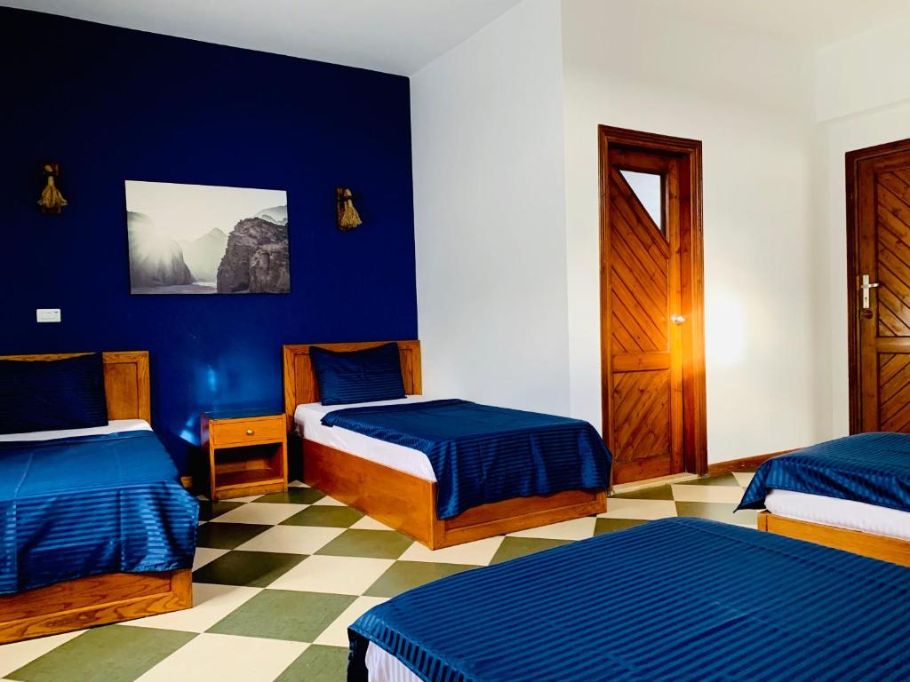 Postel nebo postele na pokoji v ubytování Sea Soul Hotel