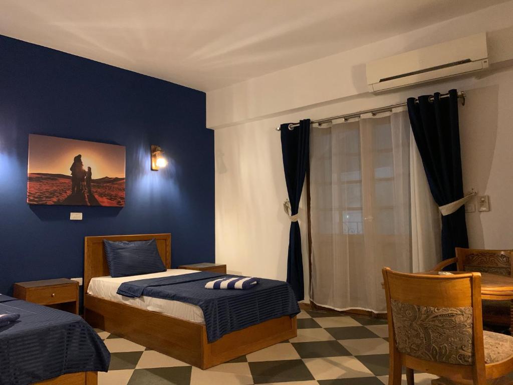 Postel nebo postele na pokoji v ubytování Sea Soul Hotel