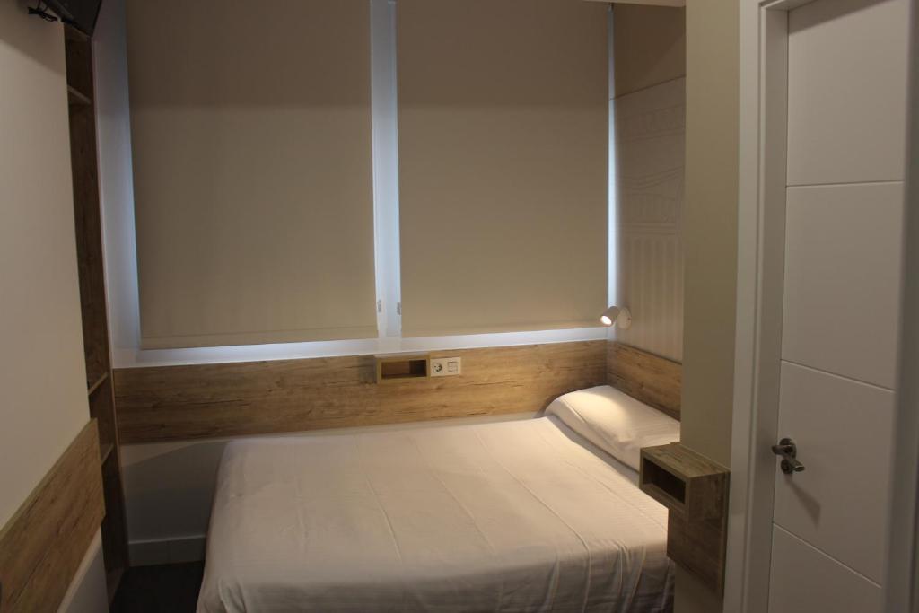 Postel nebo postele na pokoji v ubytování Deluxe Hostels & Suites Merida