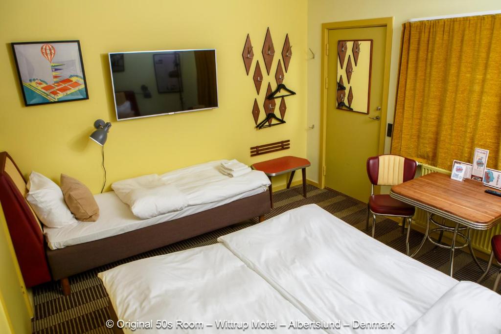 Postel nebo postele na pokoji v ubytování Wittrup Motel