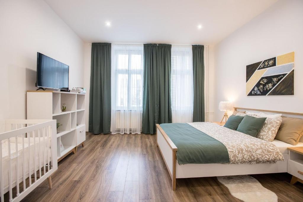 Postel nebo postele na pokoji v ubytování FAMILY Apartment OSTRAVA