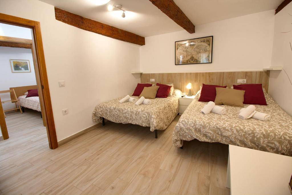 A bed or beds in a room at Cuencaloft el balcon de Ali