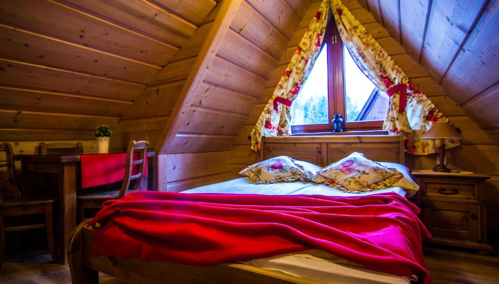 Кровать или кровати в номере Wynajem Pokoi Mariusz Biegański