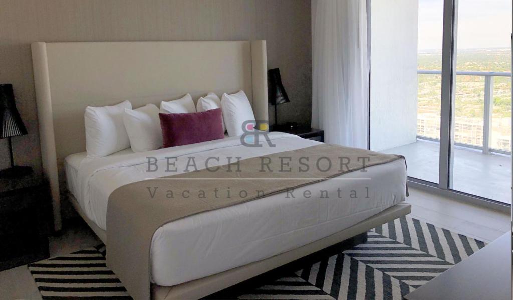 Postel nebo postele na pokoji v ubytování HYDE Beach House Apartments