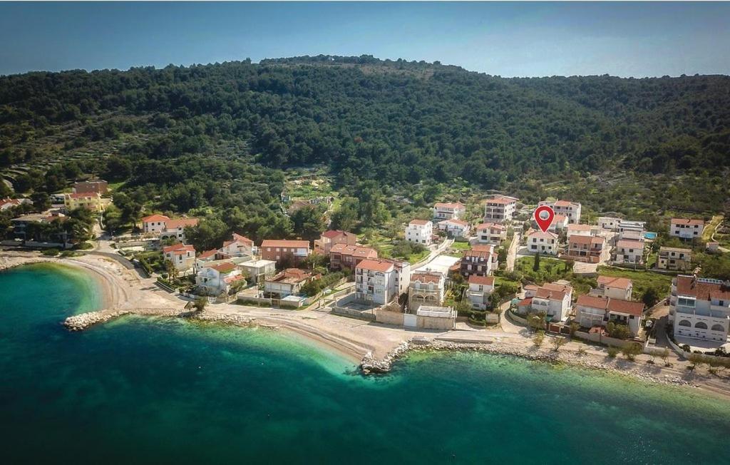 an aerial view of a resort near the water at Holiday home Sego in Slatine
