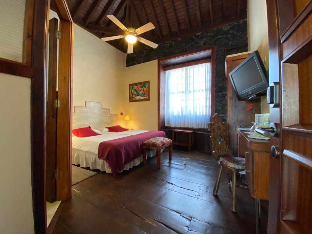 TV a/nebo společenská místnost v ubytování Gara Hotel