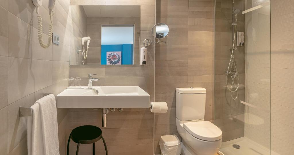 Koupelna v ubytování Hotel Olympus