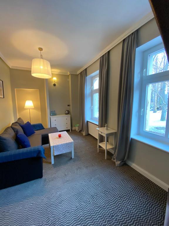 Postel nebo postele na pokoji v ubytování CIENISTA 7 APARTMENTS