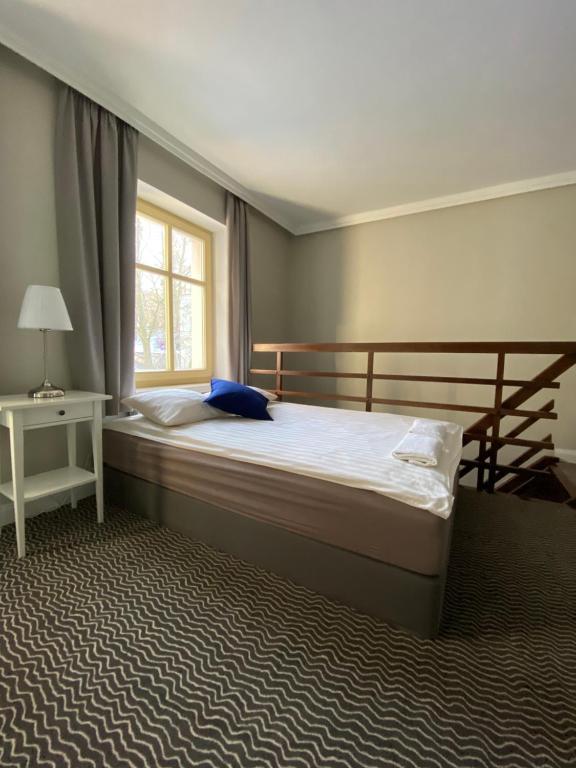Postel nebo postele na pokoji v ubytování CIENISTA 7 APARTMENTS