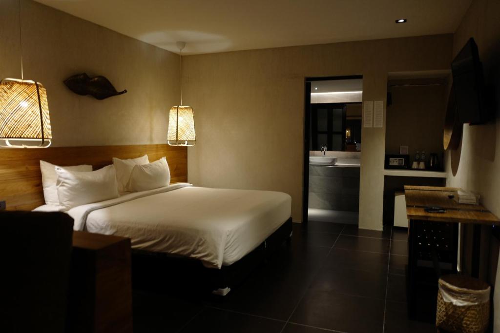 Кровать или кровати в номере Nature Beach Resort
