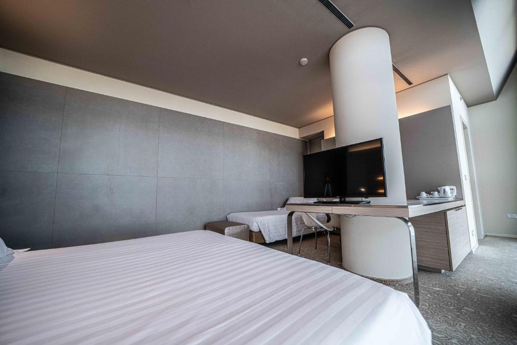 Krevet ili kreveti u jedinici u okviru objekta Best Western Plus Net Tower Hotel Padova