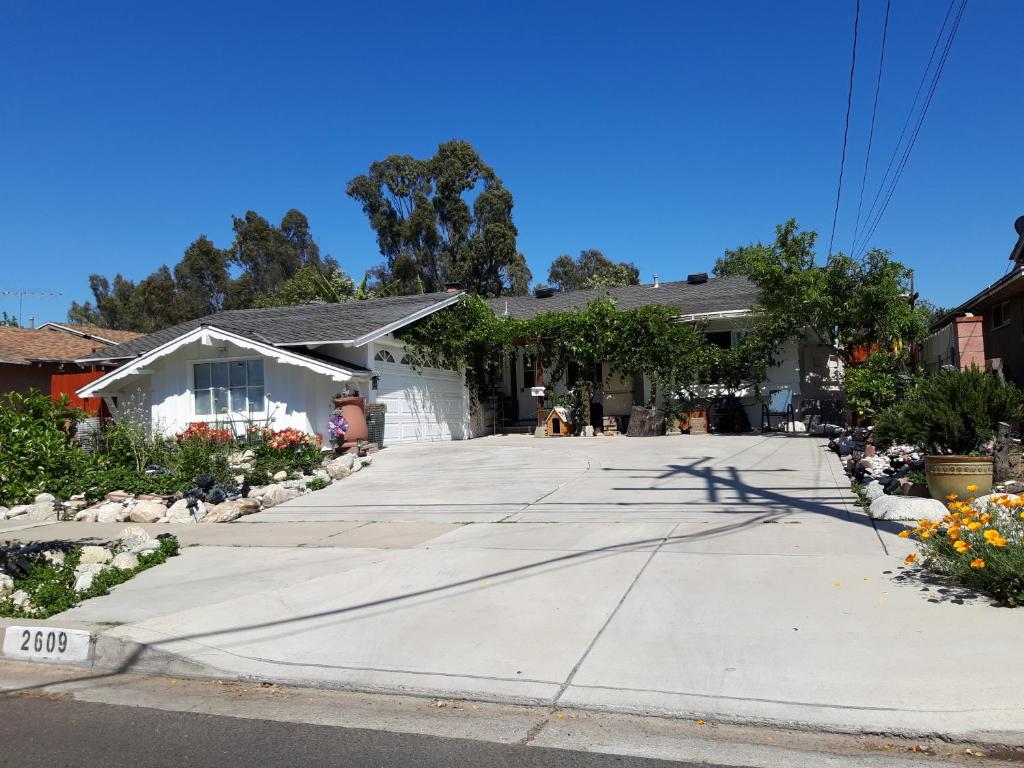 a driveway in front of a house at OC House in Santa Ana