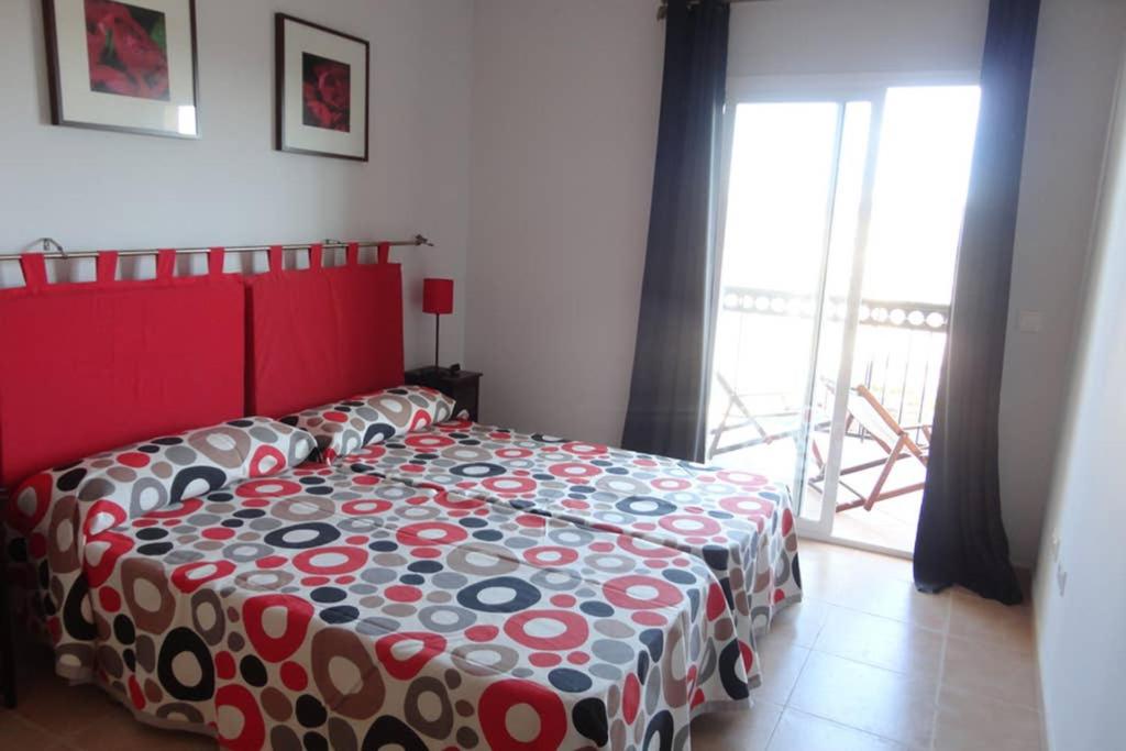 Ένα ή περισσότερα κρεβάτια σε δωμάτιο στο Apartamento en playa Canet de Berenguer